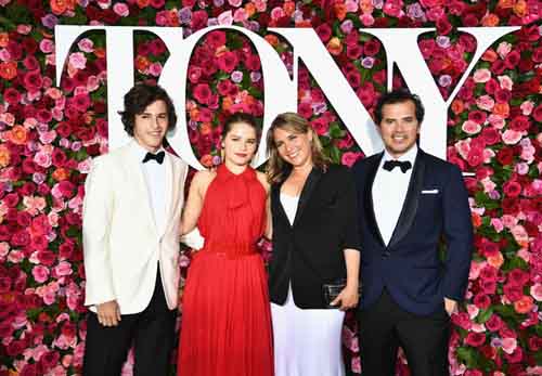 Justine Maurer and John Leguizamo with their children at 2018 Tony Awards.
